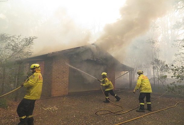 Bush fire destroys house